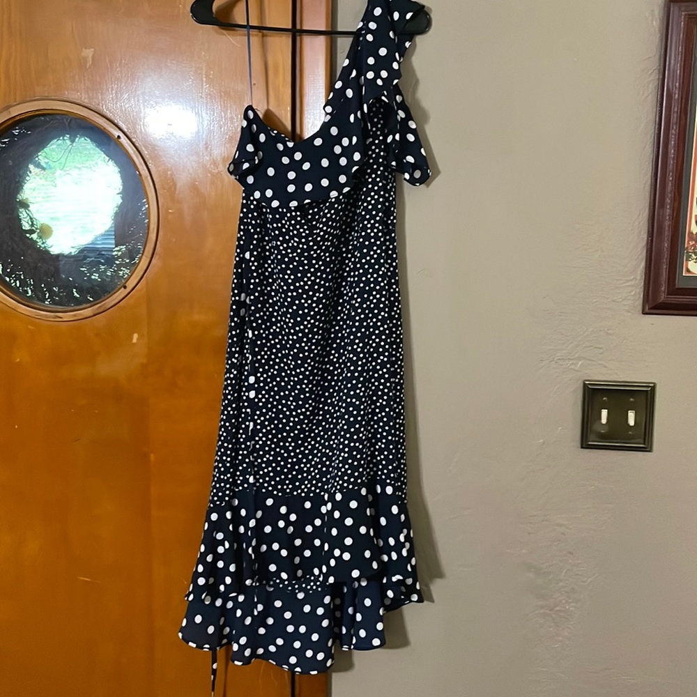 Asymmetrical one-shoulder with ruffles